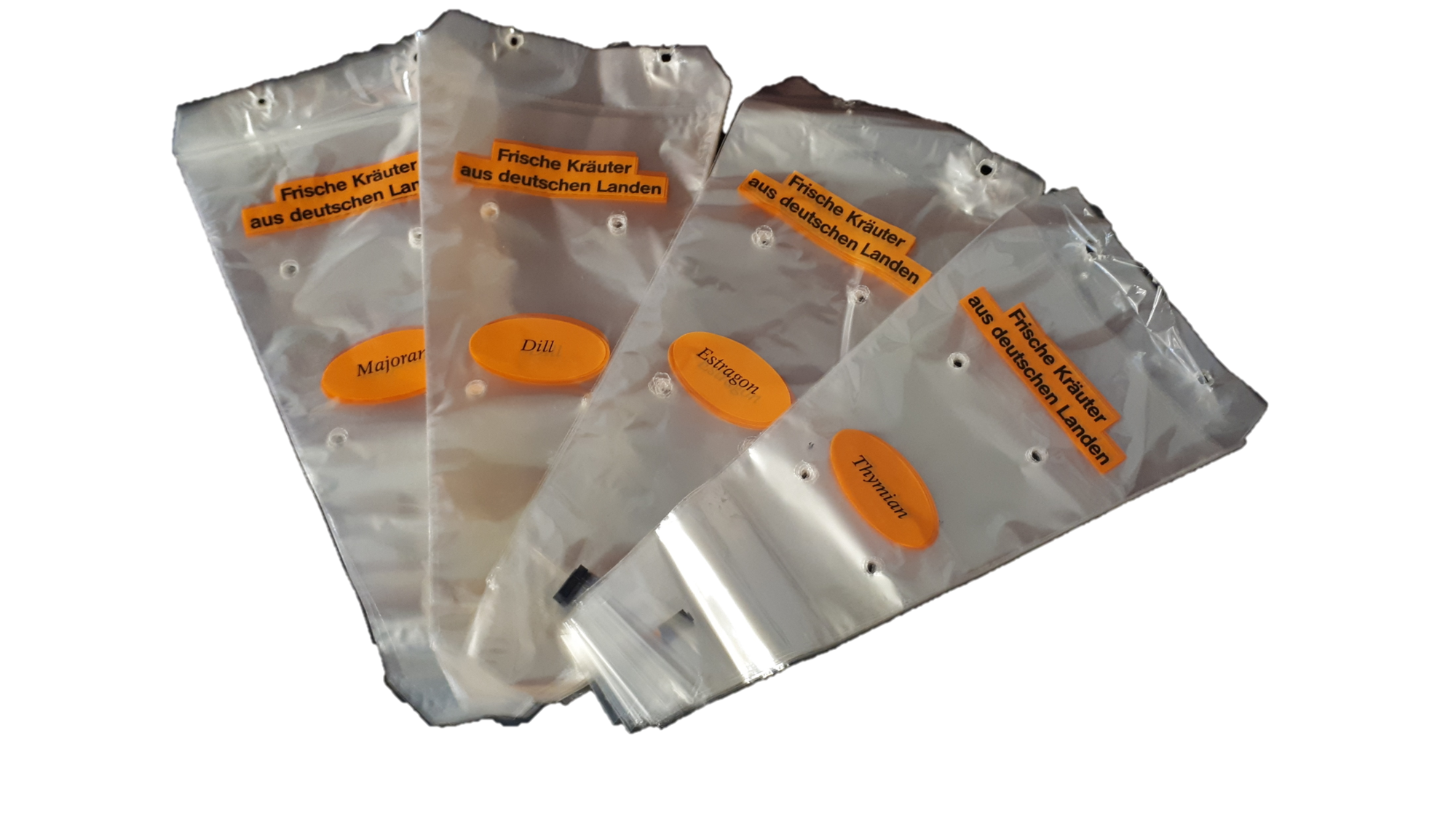 AKTION „Verpackungstrichter für Topfkräuter“, 30 my, 1-seitiger, 2-farbiger schwarz-oranger Druck, unten zu, geblockt, im Beutel gelocht